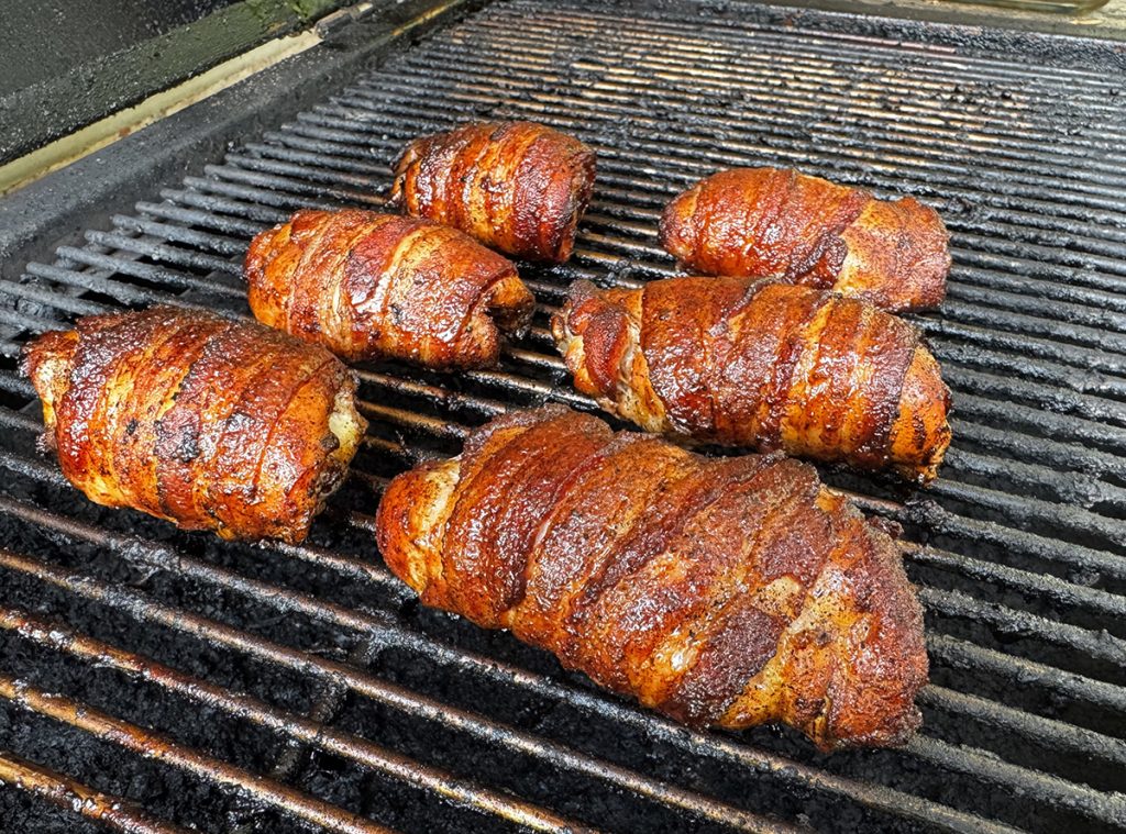 bacon-wrapped chicken on grill