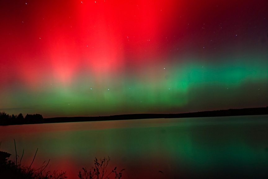 northern lights over lake