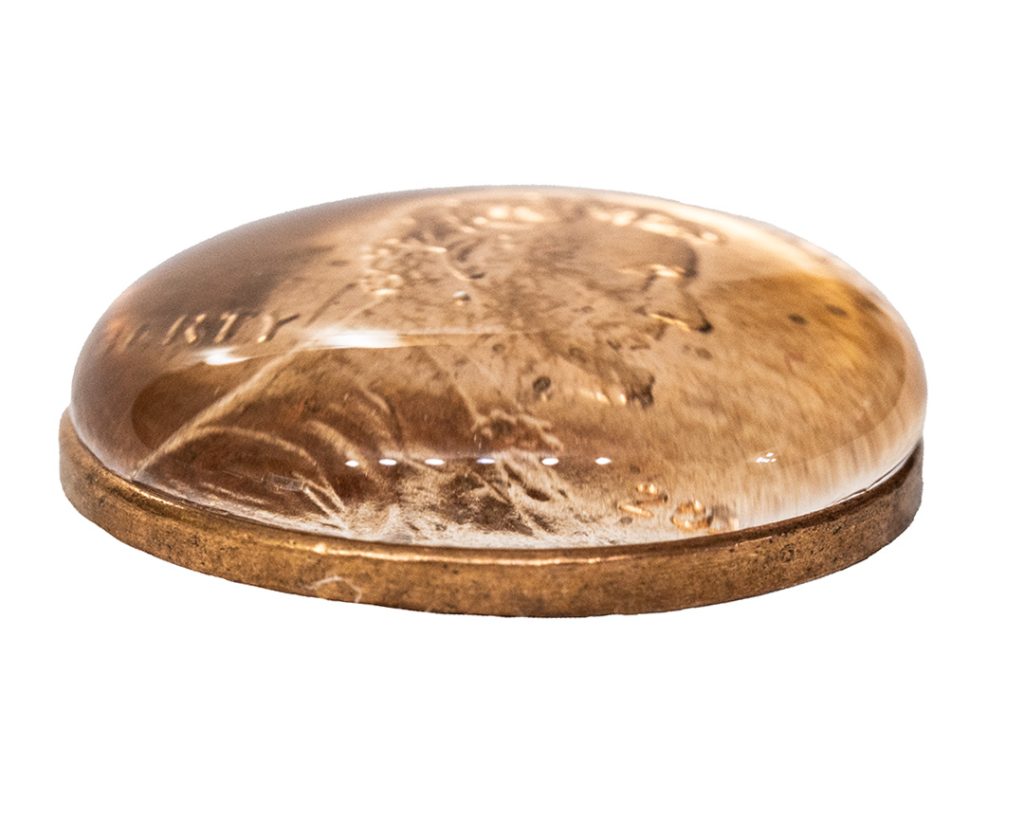 22 drops of water on penny